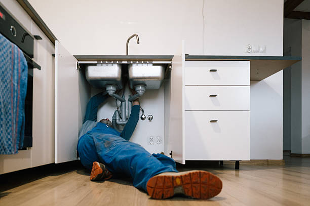 Professional Drain Cleaning technician working in Milan, NM